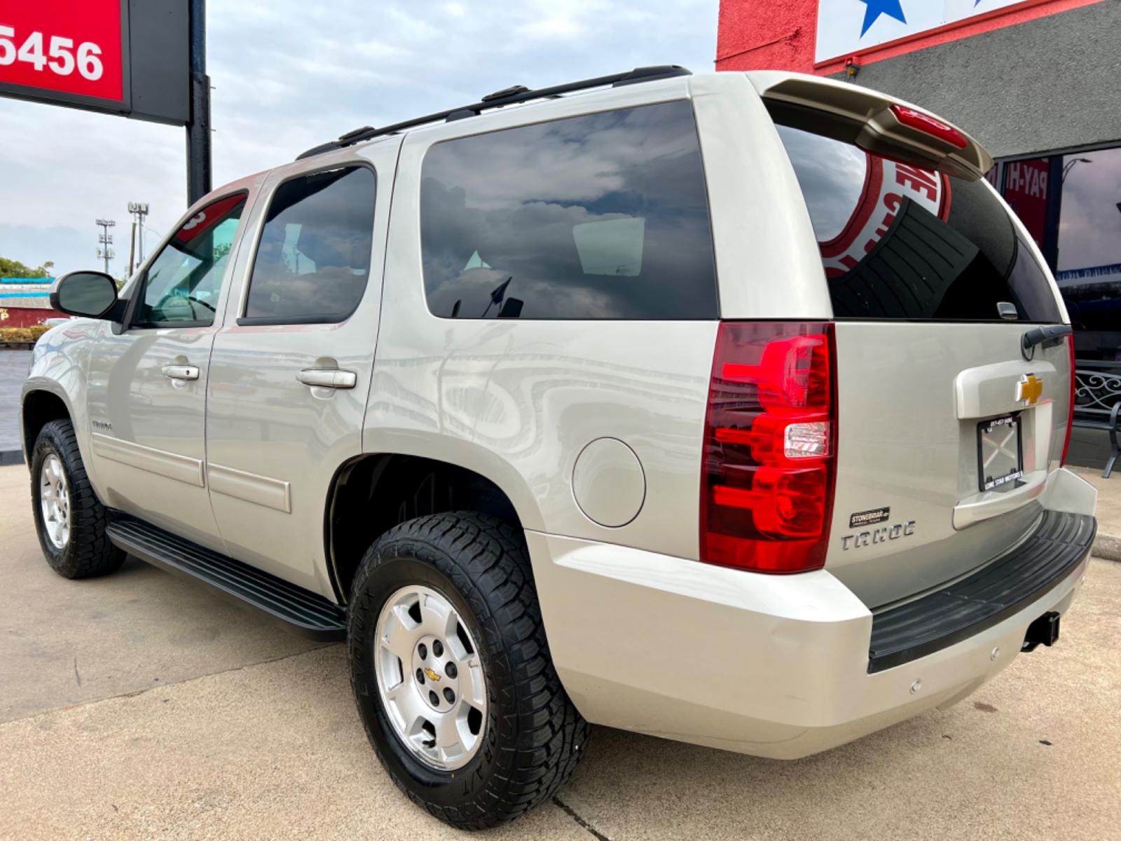 2014 GOLD CHEVROLET TAHOE LS (1GNSCAE04ER) , located at 5900 E. Lancaster Ave., Fort Worth, TX, 76112, (817) 457-5456, 0.000000, 0.000000 - This is a 2014 CHEVROLET TAHOE LS 4 DOOR SUV that is in excellent condition. There are no dents or scratches. The interior is clean with no rips or tears or stains. All power windows, door locks and seats. Ice cold AC for those hot Texas summer days. It is equipped with a CD player, AM/FM radio, AUX - Photo #3