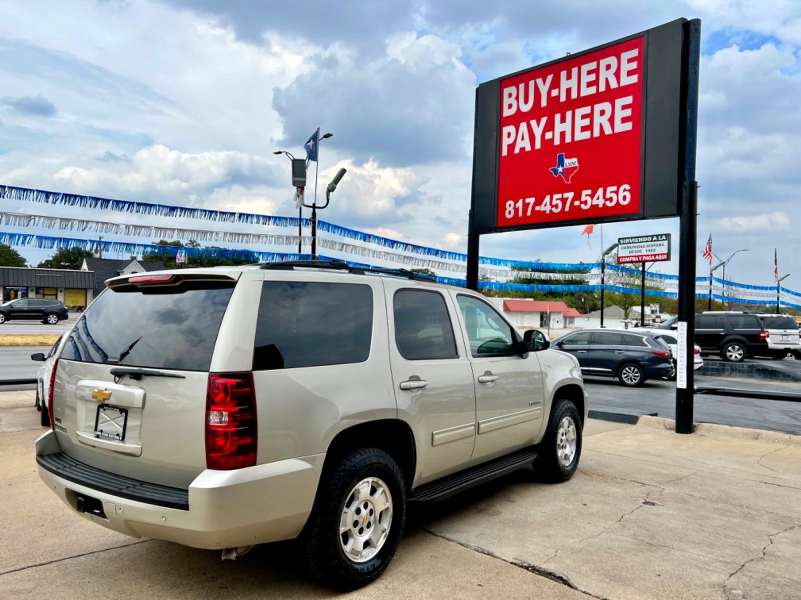 2014 GOLD CHEVROLET TAHOE LS (1GNSCAE04ER) , located at 5900 E. Lancaster Ave., Fort Worth, TX, 76112, (817) 457-5456, 0.000000, 0.000000 - This is a 2014 CHEVROLET TAHOE LS 4 DOOR SUV that is in excellent condition. There are no dents or scratches. The interior is clean with no rips or tears or stains. All power windows, door locks and seats. Ice cold AC for those hot Texas summer days. It is equipped with a CD player, AM/FM radio, AUX - Photo #5