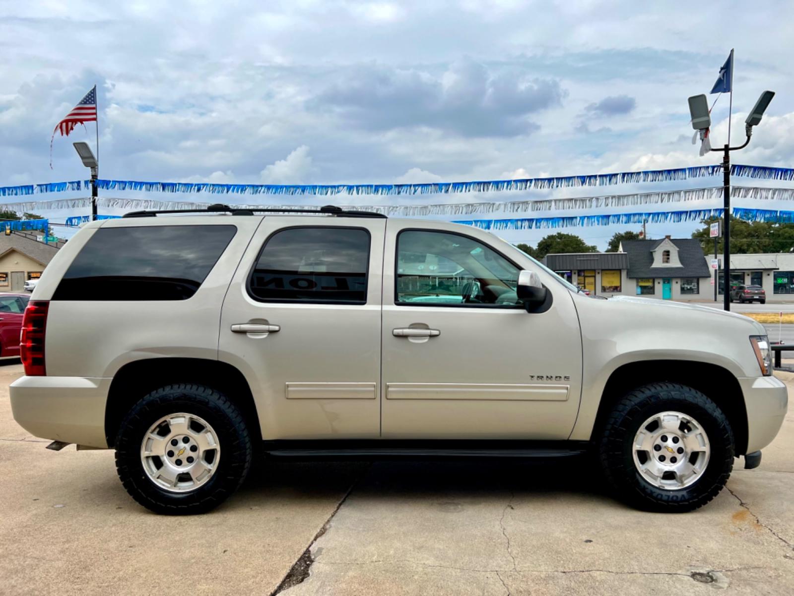 2014 GOLD CHEVROLET TAHOE LS (1GNSCAE04ER) , located at 5900 E. Lancaster Ave., Fort Worth, TX, 76112, (817) 457-5456, 0.000000, 0.000000 - This is a 2014 CHEVROLET TAHOE LS 4 DOOR SUV that is in excellent condition. There are no dents or scratches. The interior is clean with no rips or tears or stains. All power windows, door locks and seats. Ice cold AC for those hot Texas summer days. It is equipped with a CD player, AM/FM radio, AUX - Photo #6