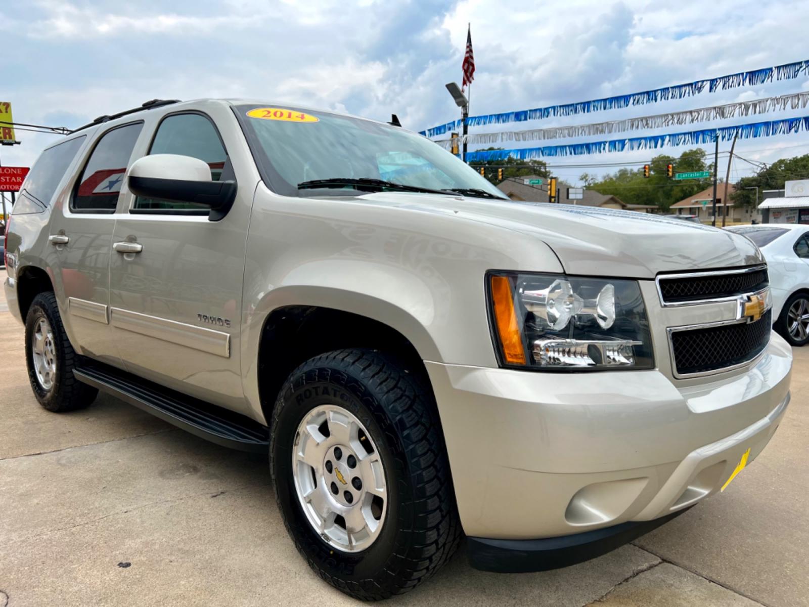 2014 GOLD CHEVROLET TAHOE LS (1GNSCAE04ER) , located at 5900 E. Lancaster Ave., Fort Worth, TX, 76112, (817) 457-5456, 0.000000, 0.000000 - This is a 2014 CHEVROLET TAHOE LS 4 DOOR SUV that is in excellent condition. There are no dents or scratches. The interior is clean with no rips or tears or stains. All power windows, door locks and seats. Ice cold AC for those hot Texas summer days. It is equipped with a CD player, AM/FM radio, AUX - Photo #7